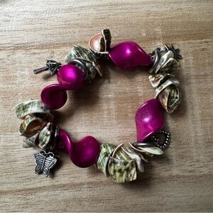 Stretchy shell bracelet with charms